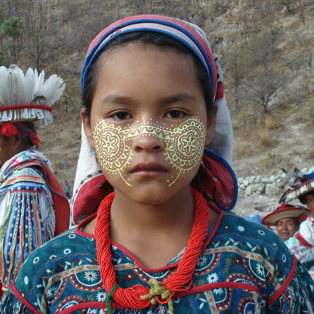 Indigenous girl with face painting